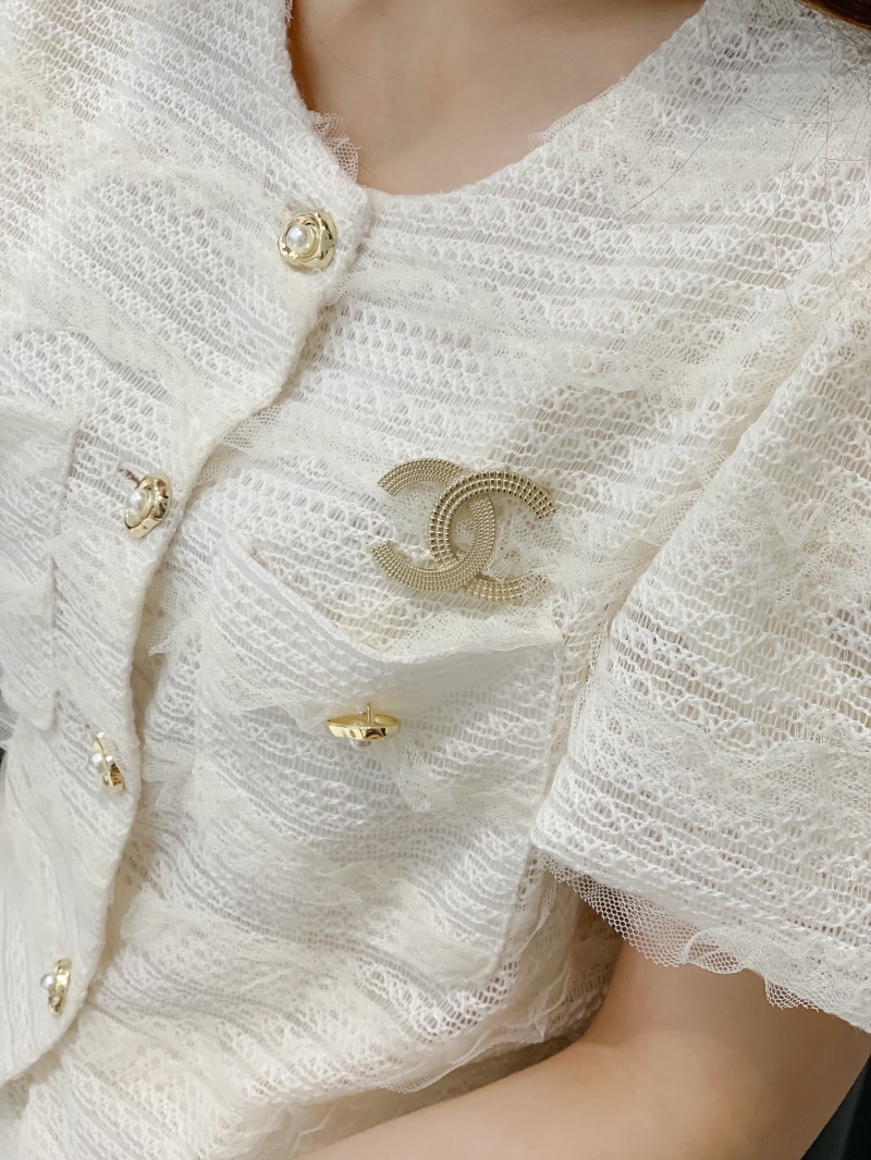 Ch**el brooches